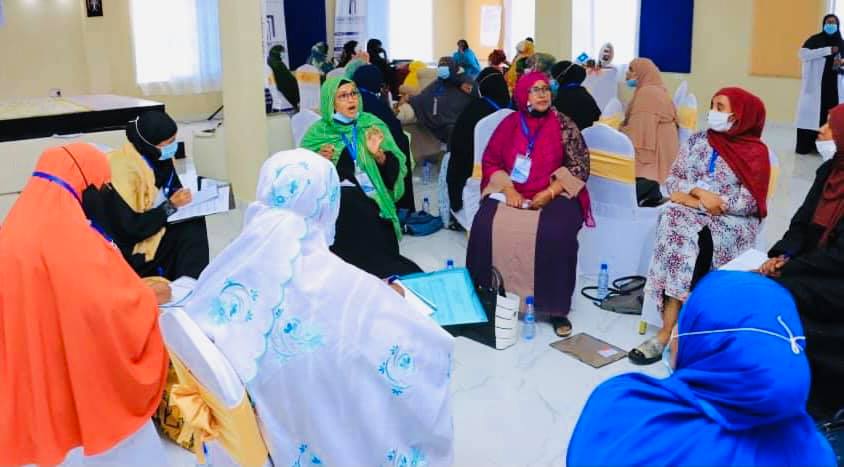 Participants in breakout consultations during the KAAD Institute dialogue on the role of women in elections, leadership, and peace, Garowe